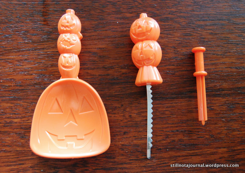 The finest pumpkin carving kit three bucks can buy. Not sure what the poky thing on the right is for. We used it for poking.