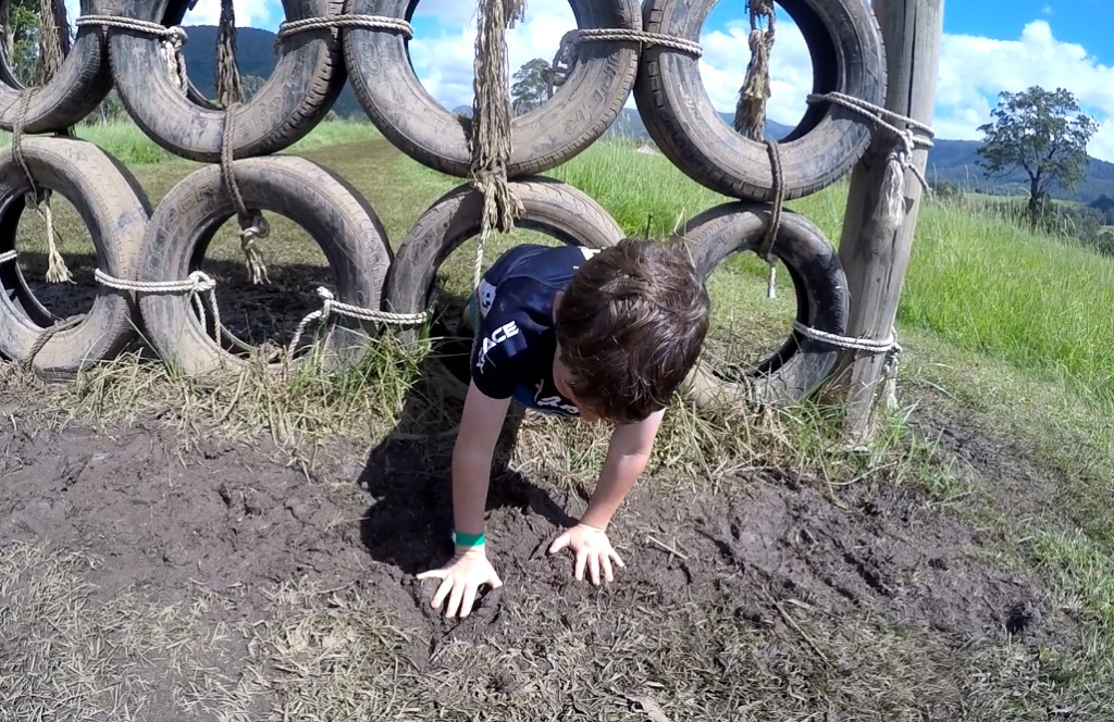 tyre crawl obstacle on the Gold Coast Raw Challenge
